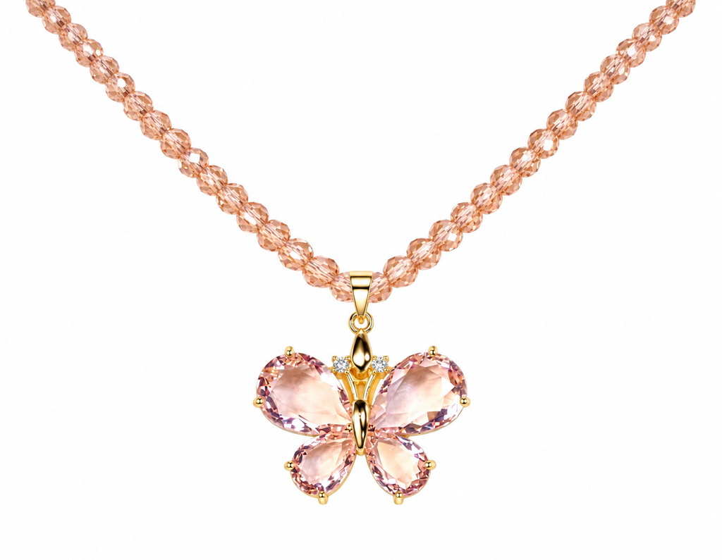 Pink faceted crystal butterfly pendant on a blush-pink beaded necklace