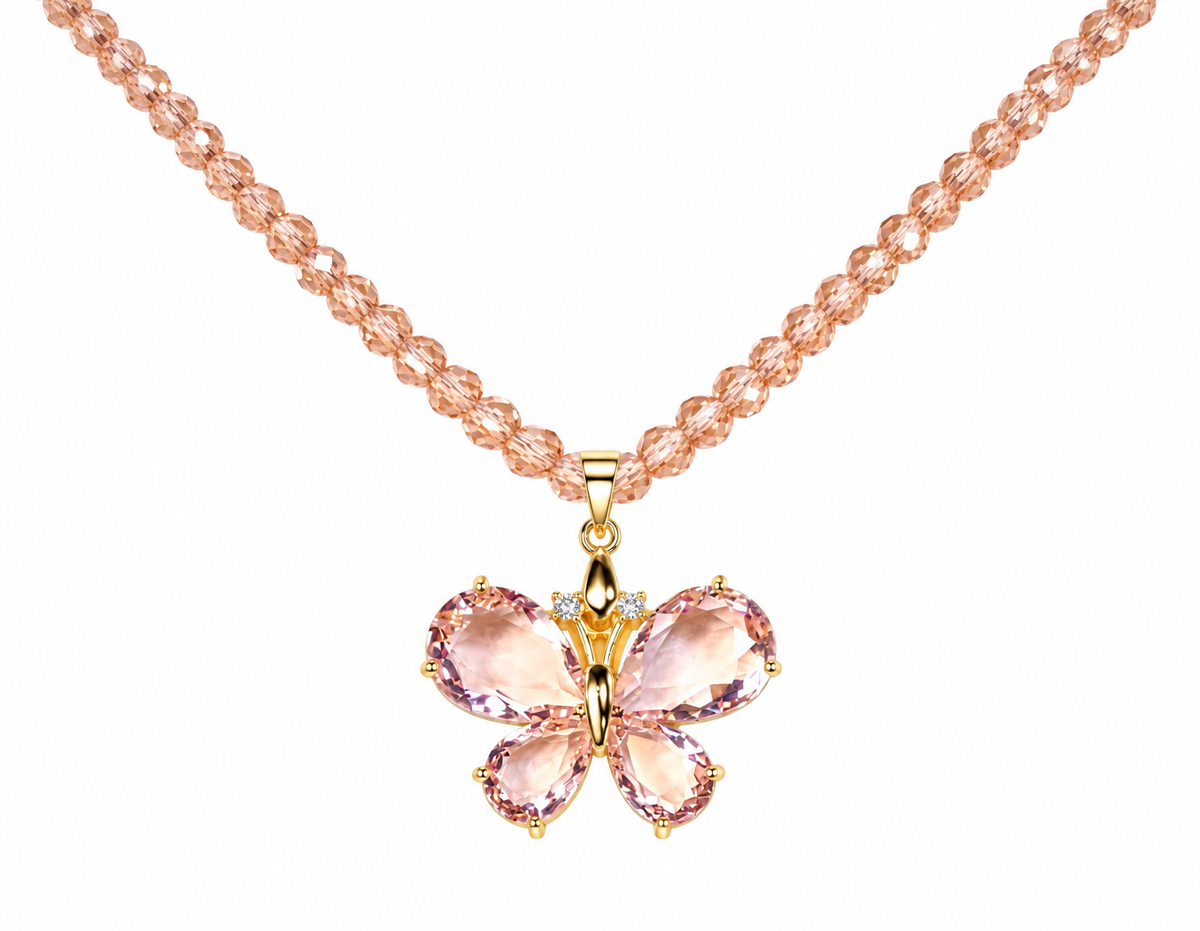 Pink faceted crystal butterfly pendant on a blush-pink beaded necklace